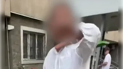 Алматыда ер адам ойнап жүрген бүлдіршінді жұлқып көтеріп, лақтырып жіберді (ВИДЕО)